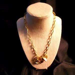 Gold necklace with shell charms